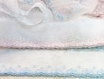 Swiss Embroidered Bows on Netting Lace - Pink or Blue